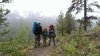 Dad, Briggs, Cole on our way out, wet, muddy.jpg